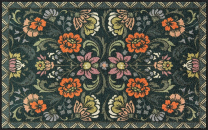 Große Salonloewe Fußmatte mit symmetrischem Blumenmuster auf dunkelgrünem Hintergrund